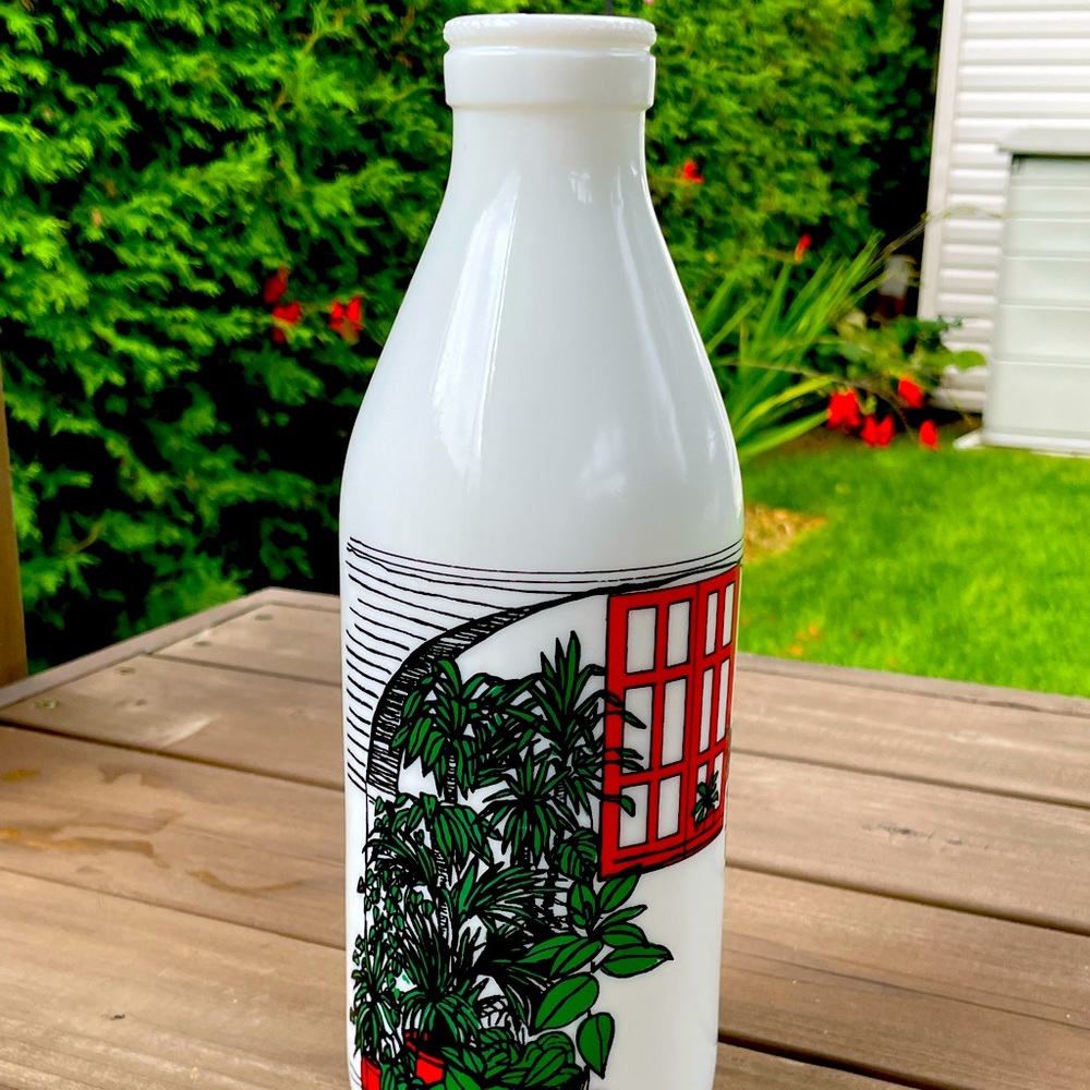 Egizia milk glass bottle. Vintage 1970’s. Design with plants in window.